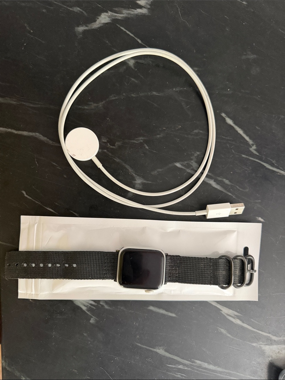 Apple Black Smartwatch series 6 with Black Nylon Band and White Magnetic Charger